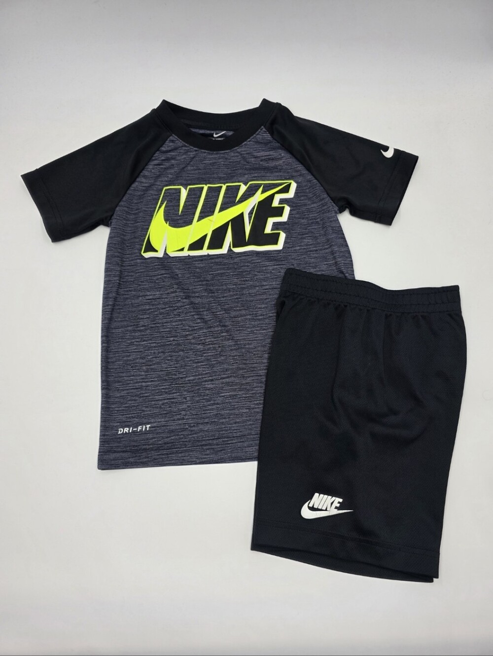 Nike boys' Dri-Fit tee and black athletic shorts size 6
